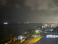 Towards ocean from balcony, also can see from bed.