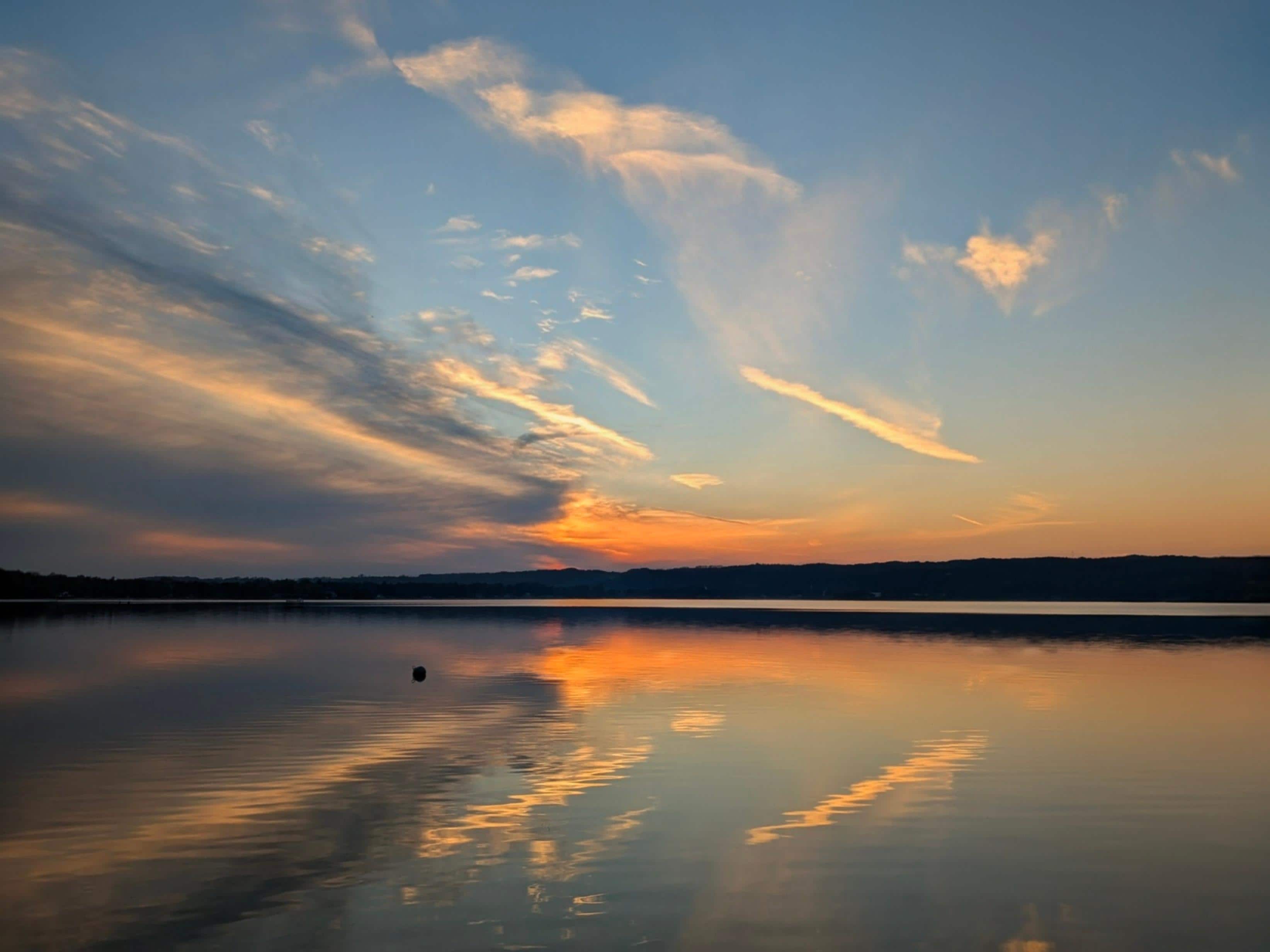 Sunset from the dock at the Stone Terrace Beach Cottage. 10/18/2025