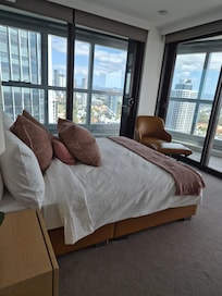 This is the second bedroom that overlooks the hinterlands. It also has access to the balcony