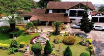 Beautiful garden area in rear with gardens