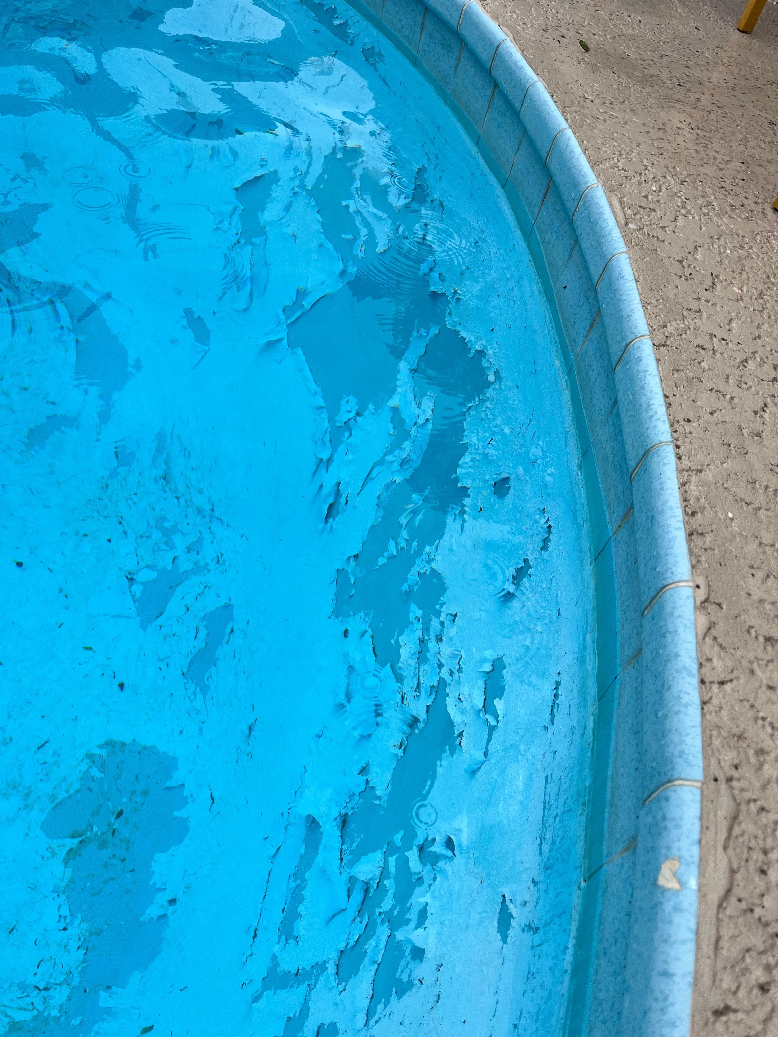 The paint within the pool. 