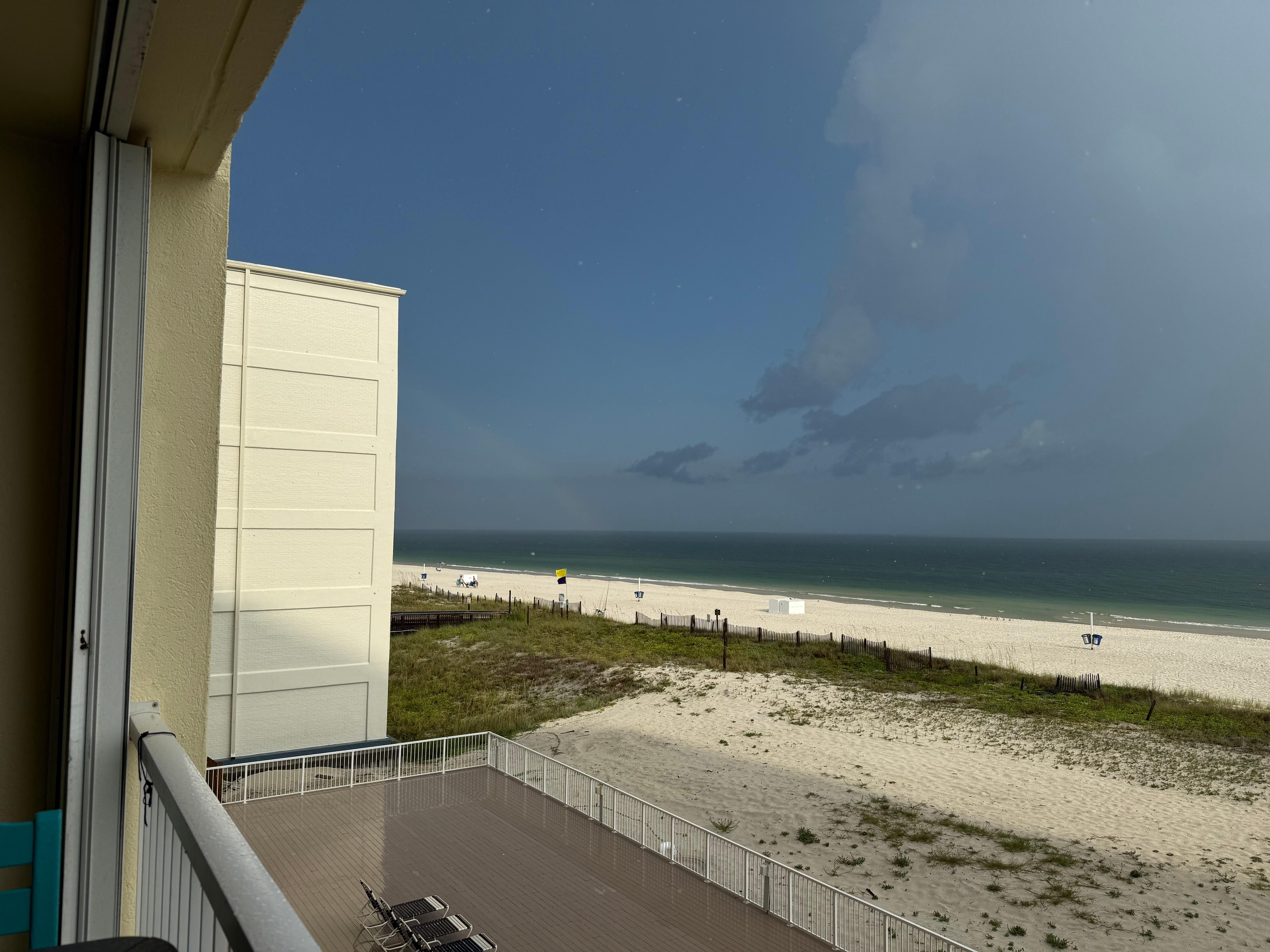 A view of a rainbow from the balcony