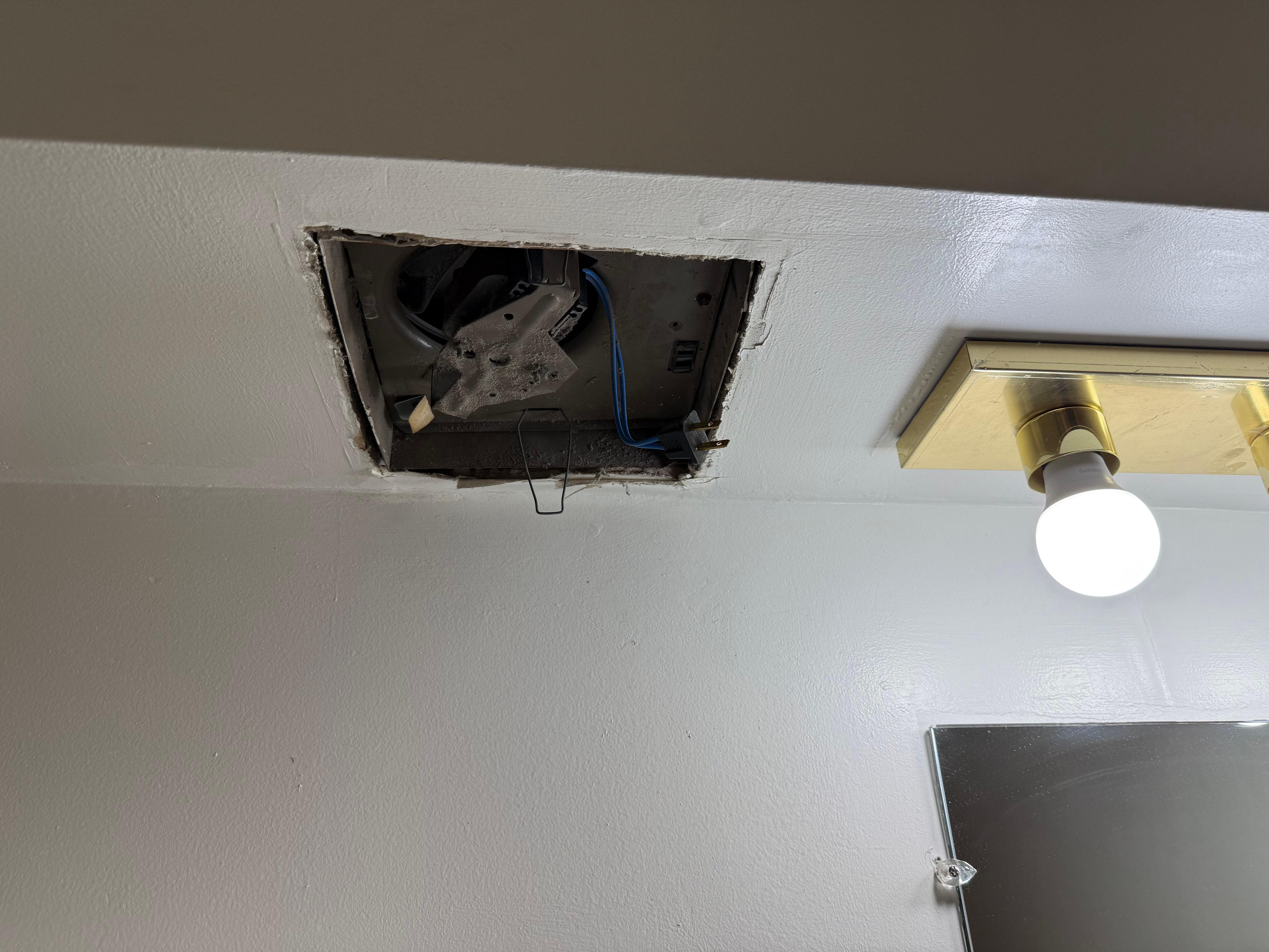 Bathroom vent missing.