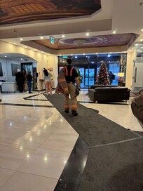 Staff is removing water from lobby