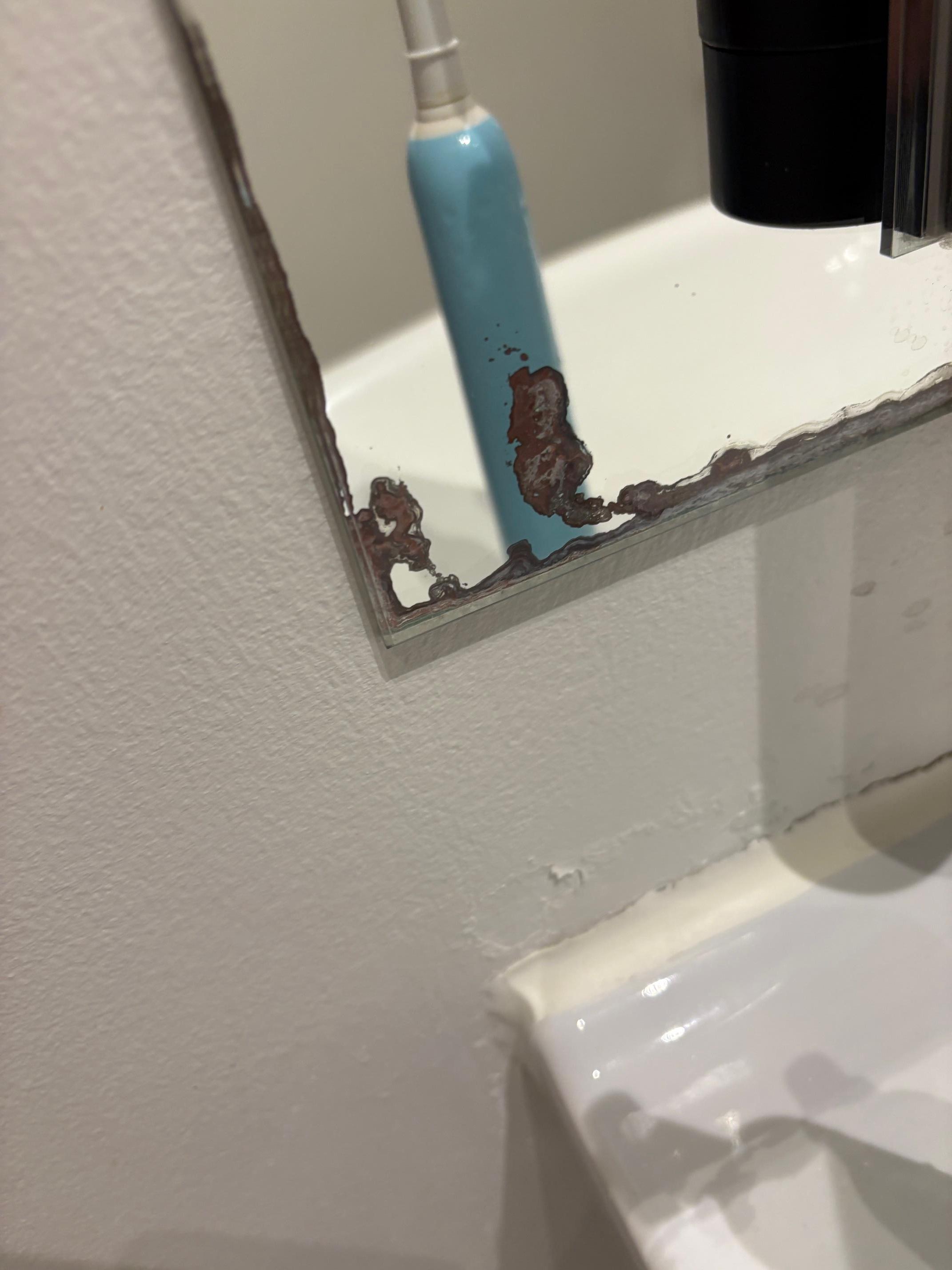 Mirror rusting away