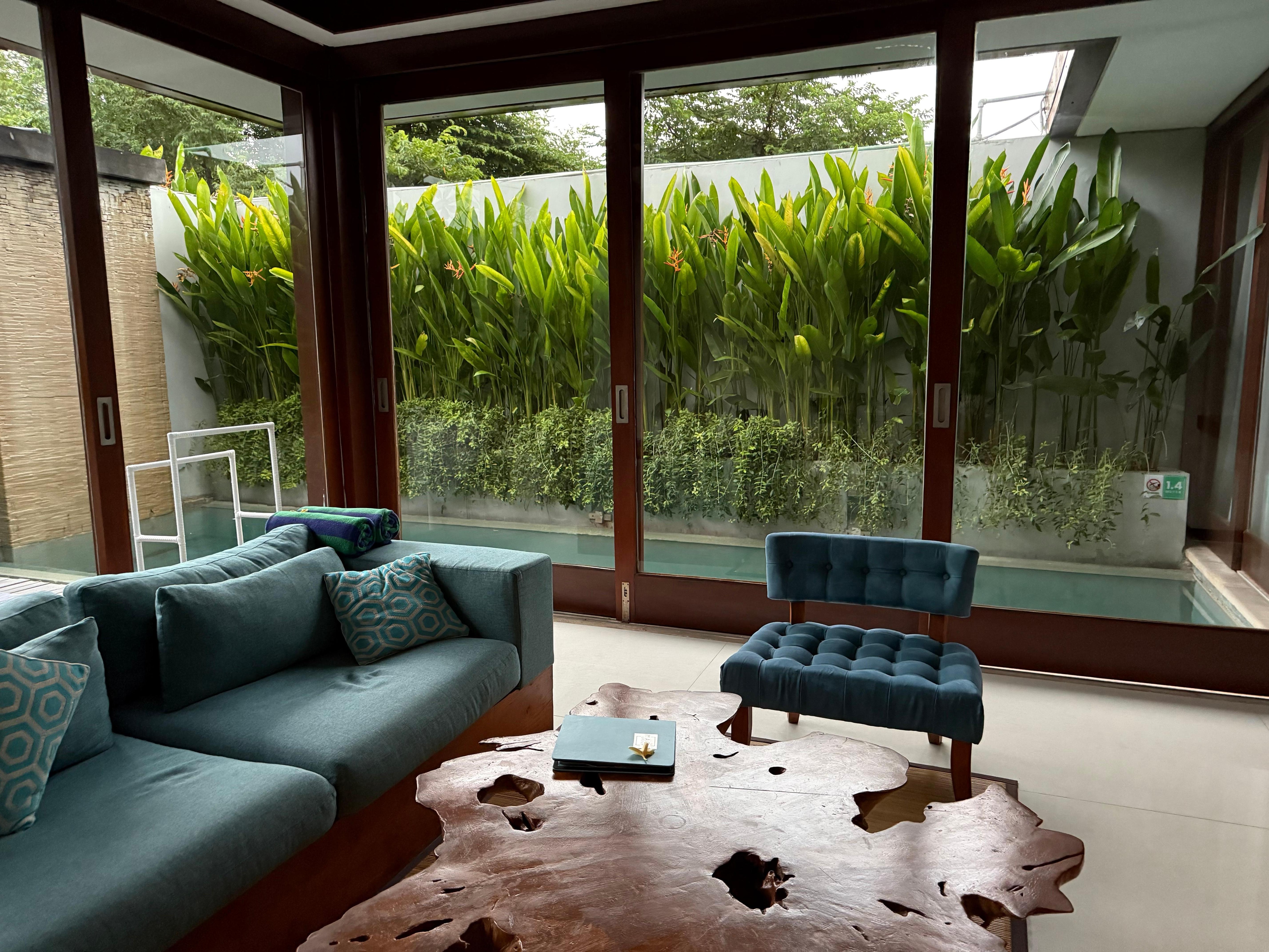 Big lounge room with great view of the private pool