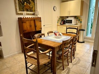 Well stocked kitchen that opens onto the terrace