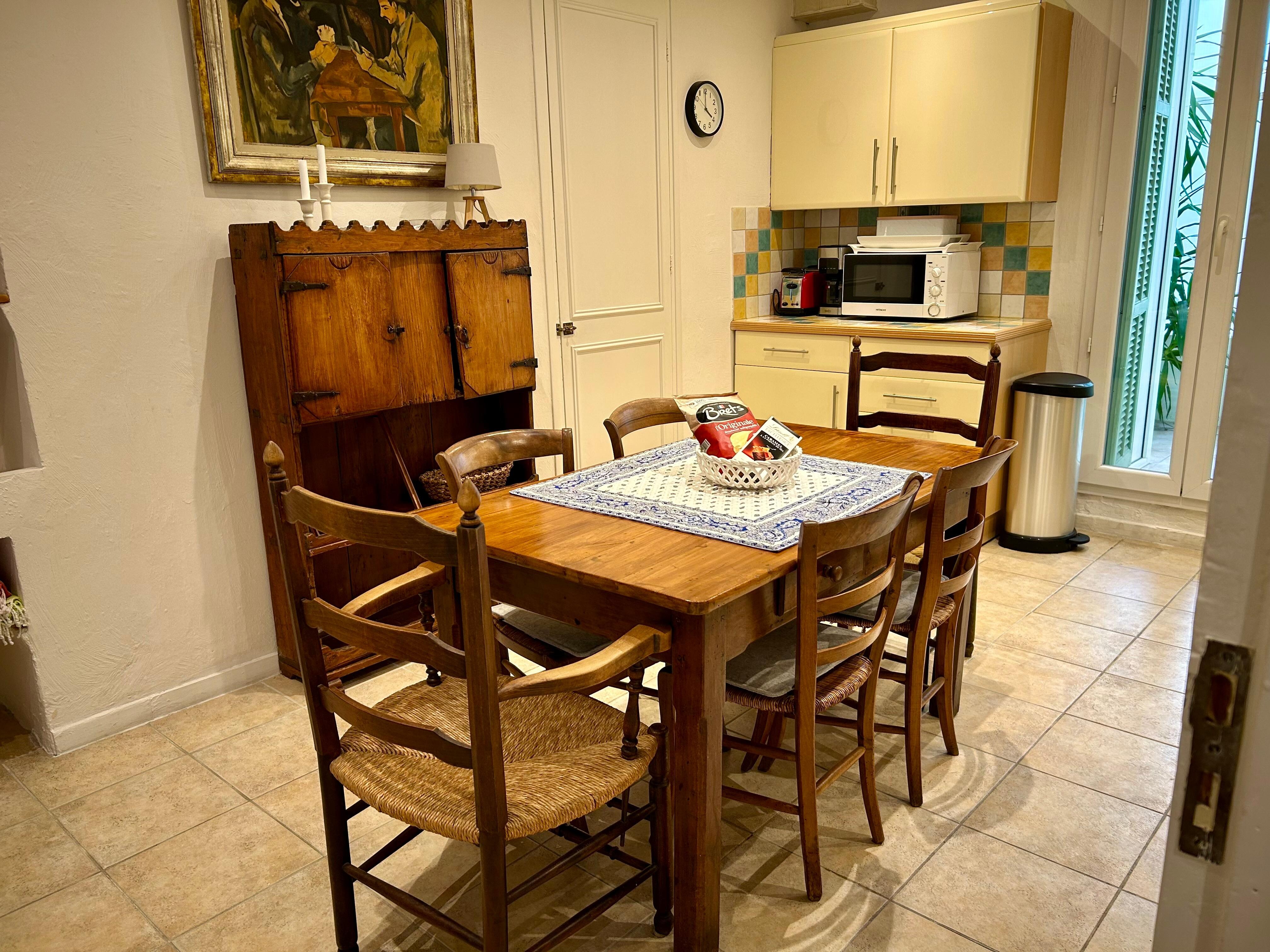 Well stocked kitchen that opens onto the terrace