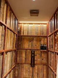 Shower surrounded by ceramic books