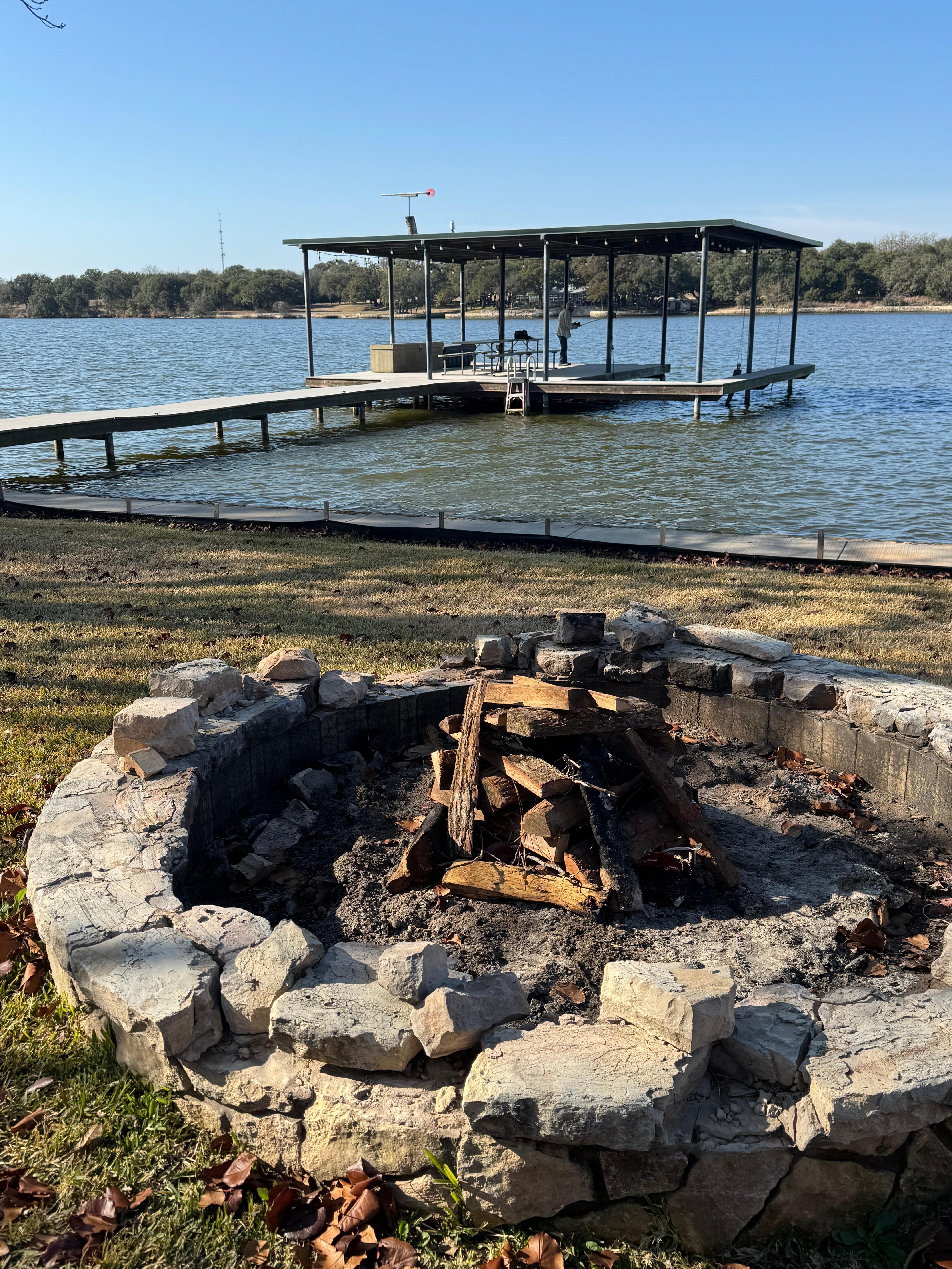 The property fire pit set up for evening family time and roasting marshmallows.