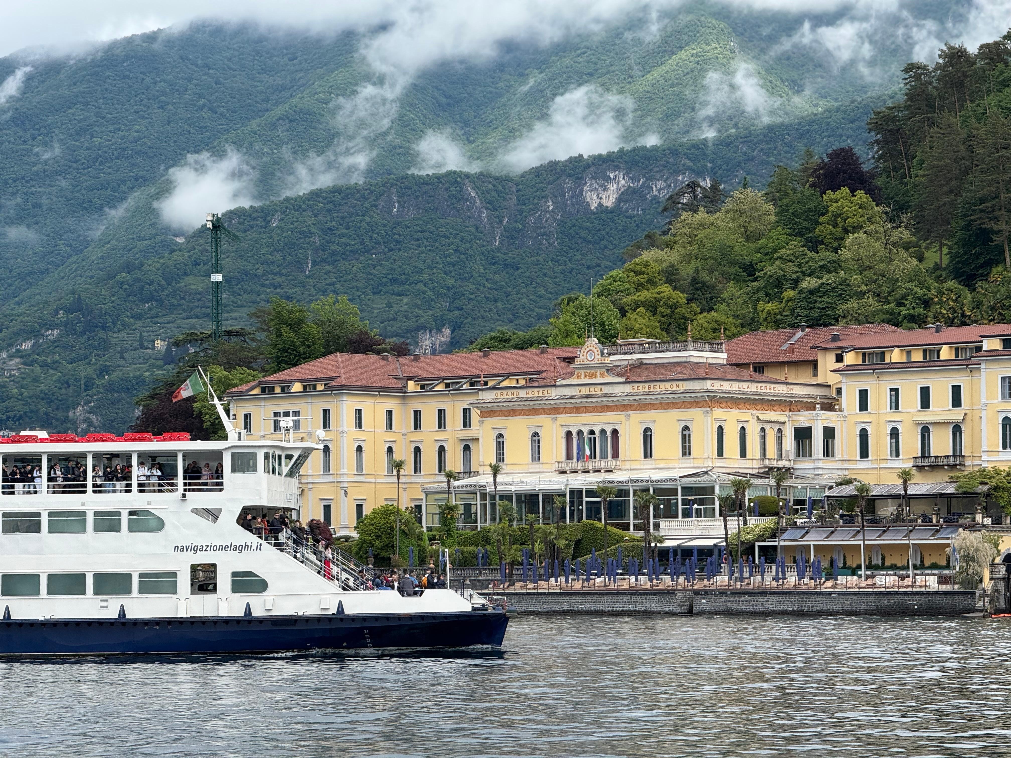 View from ferry of Bellagio and mountains. 