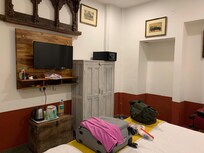 Pay for TV channels, no desk to write on, no proper chair to sit on. No proper table to place a computer or ither items for daily use