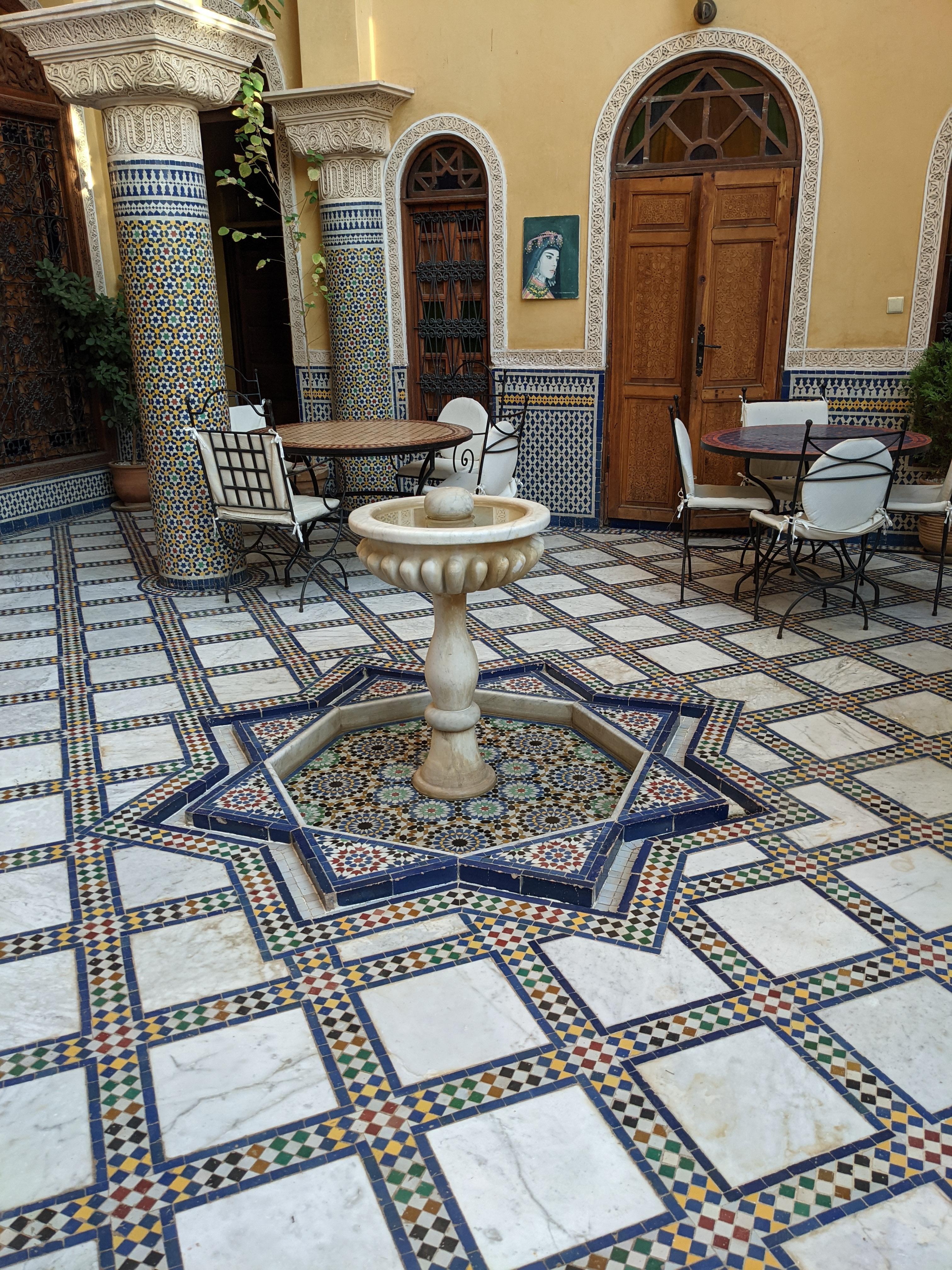 The fountain gently bubbling in the courtyard. There was a small pool as well, but we did not use it.