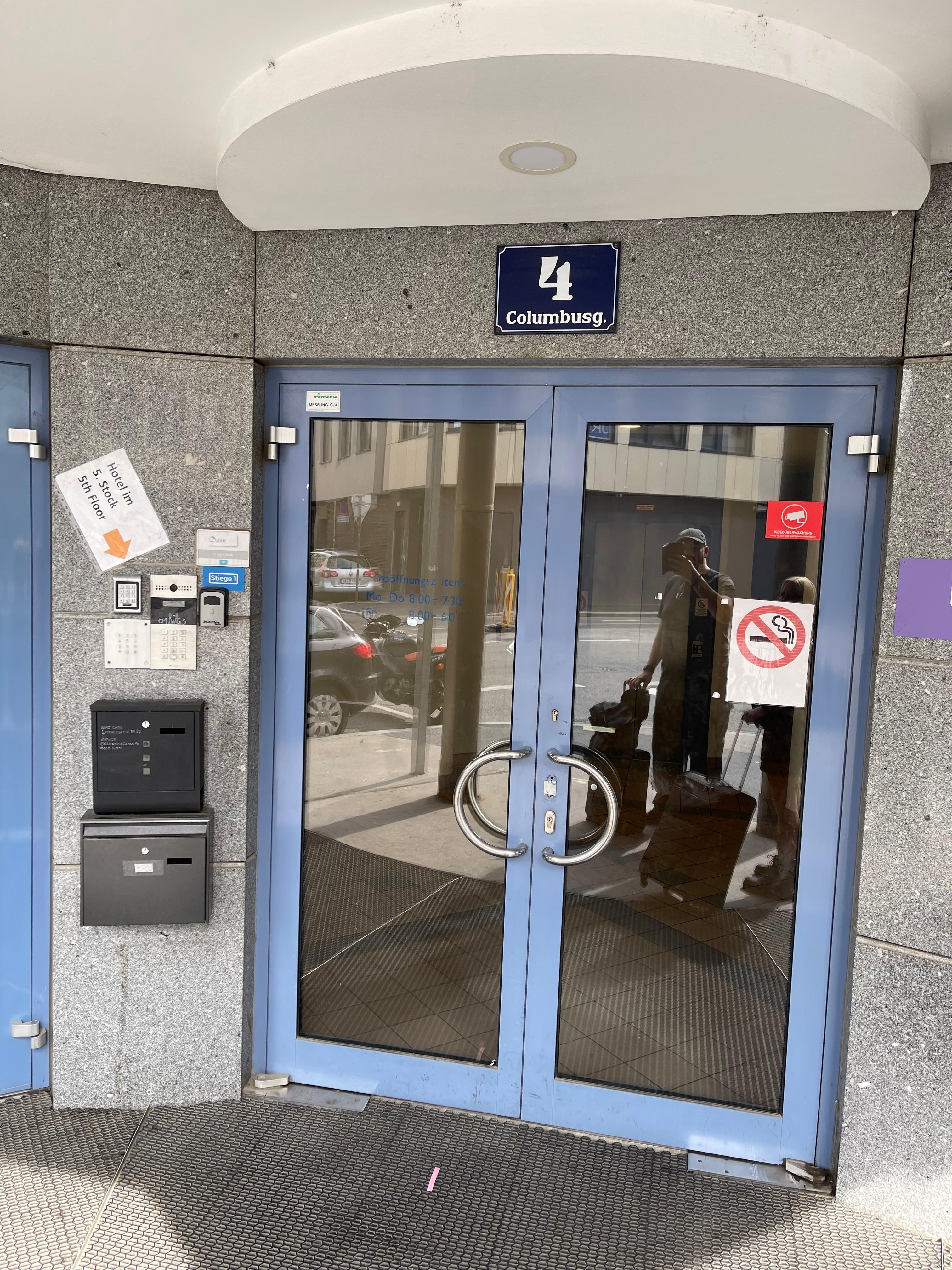 The hotel entrance (the laminated sheet is the only clue that it was the hotel)