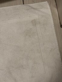 A little tall that they give you into lay down in front of the shower. As you can see stain.