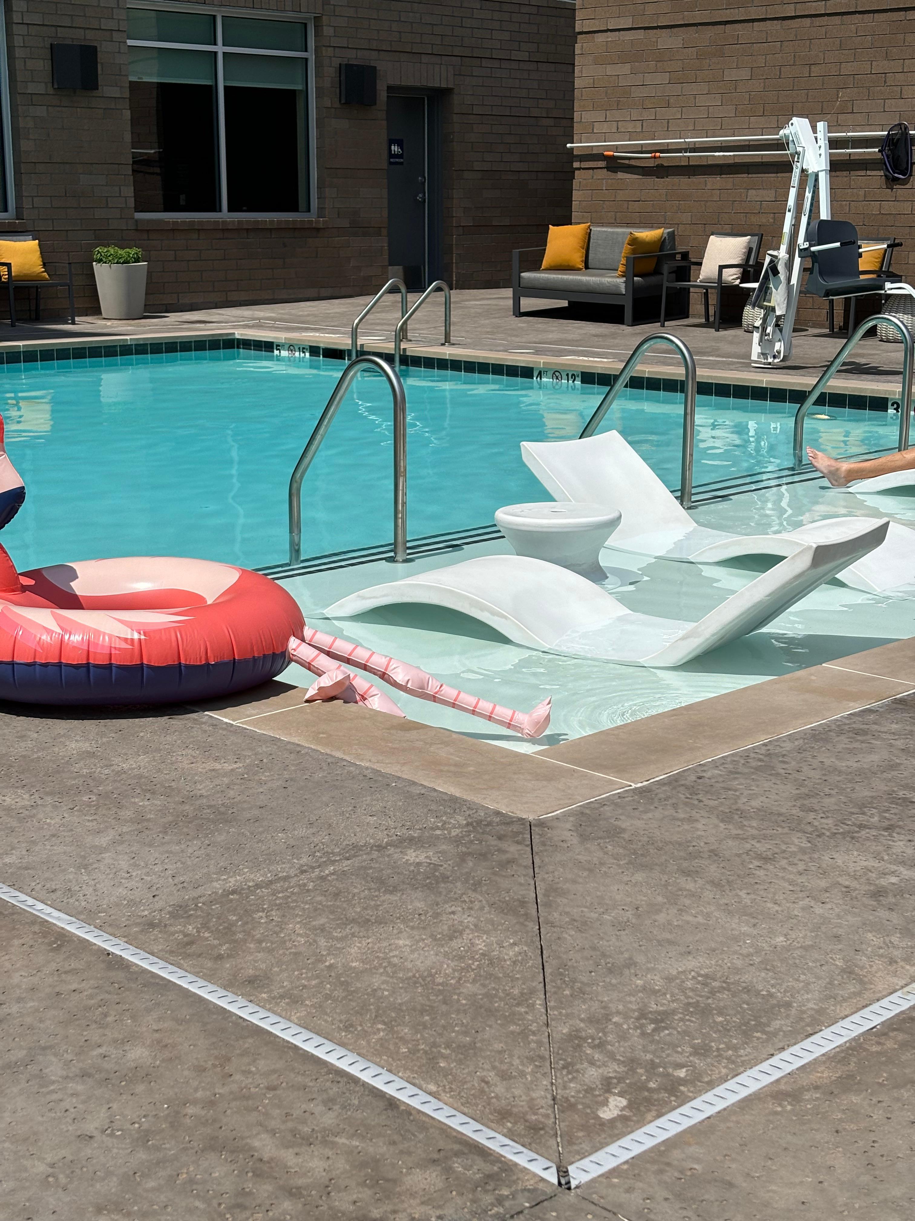 The lounge chairs in water ❤️