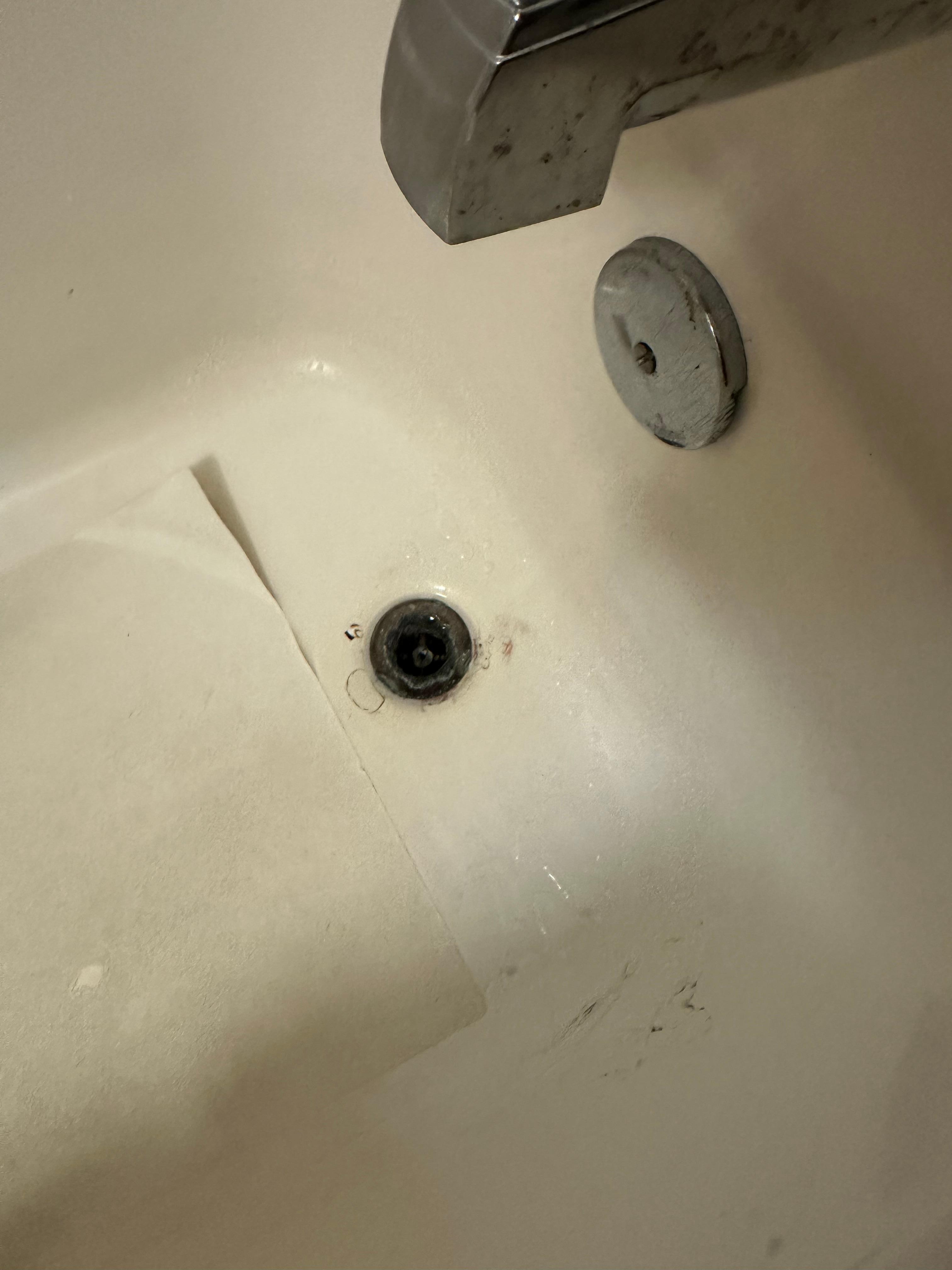 Rusty, dirty bathtub drain