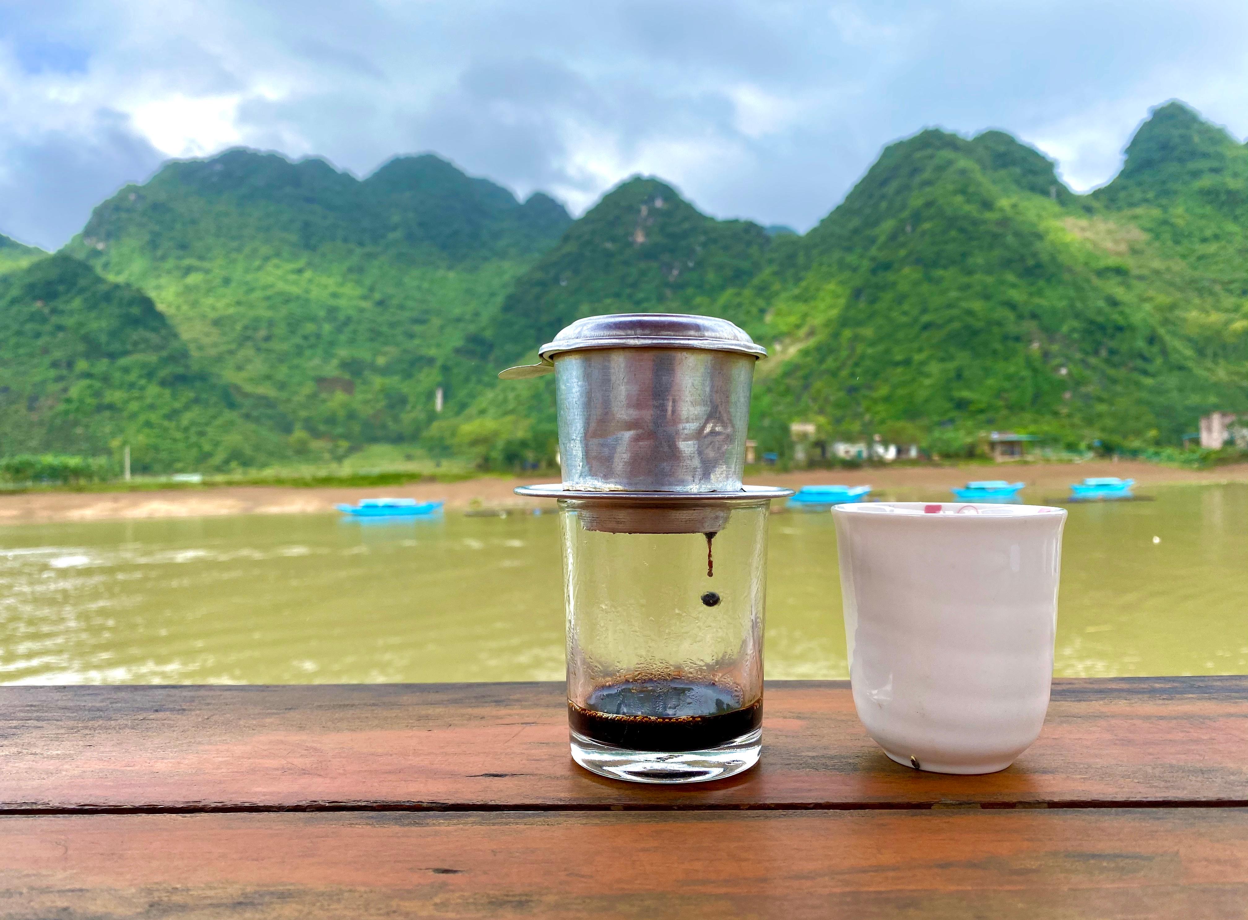 Morning coffee overlooking the river and the mountains