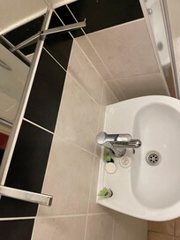 Missing shelf and broken mirror