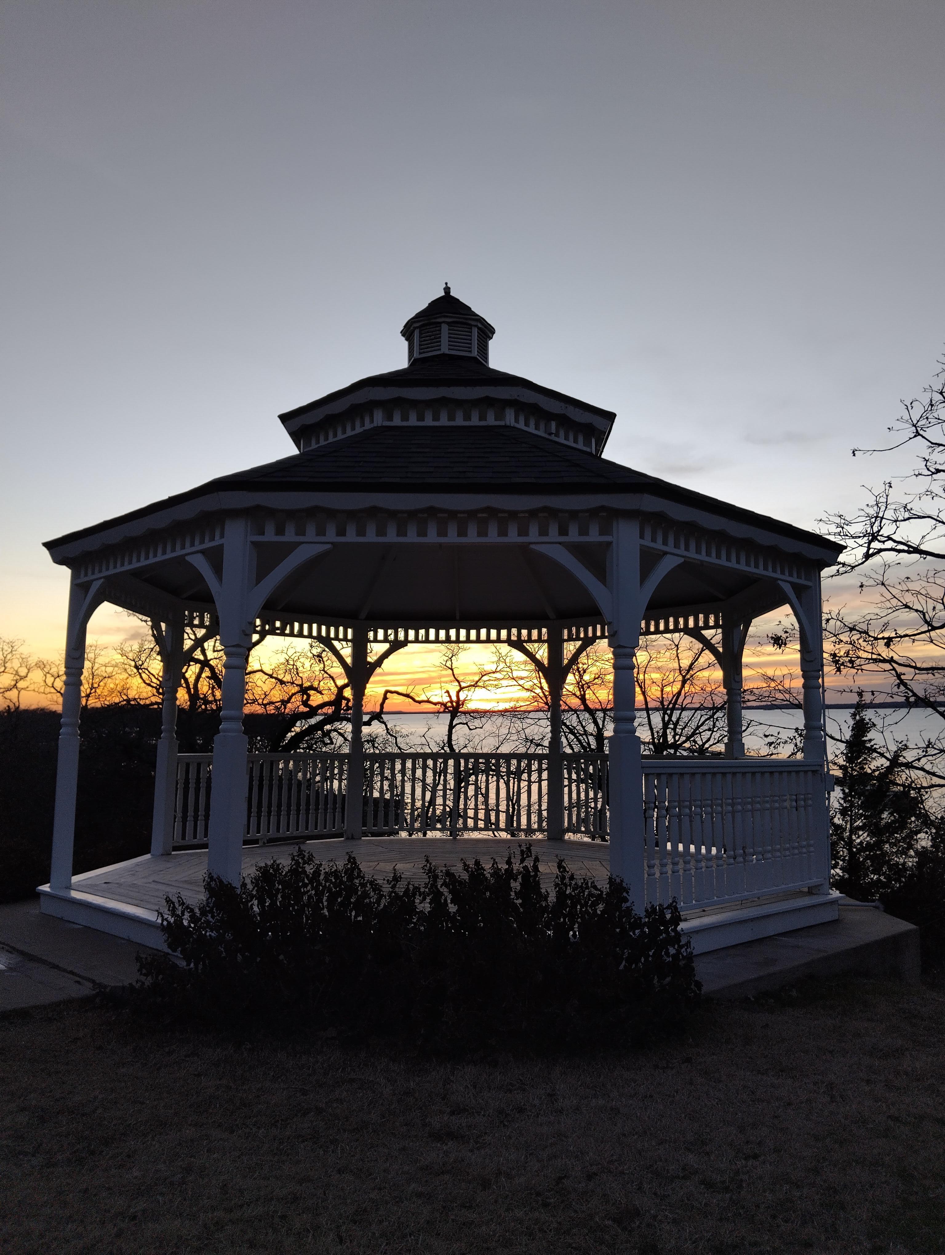 Pergola on the hotel lawn overlooking the water