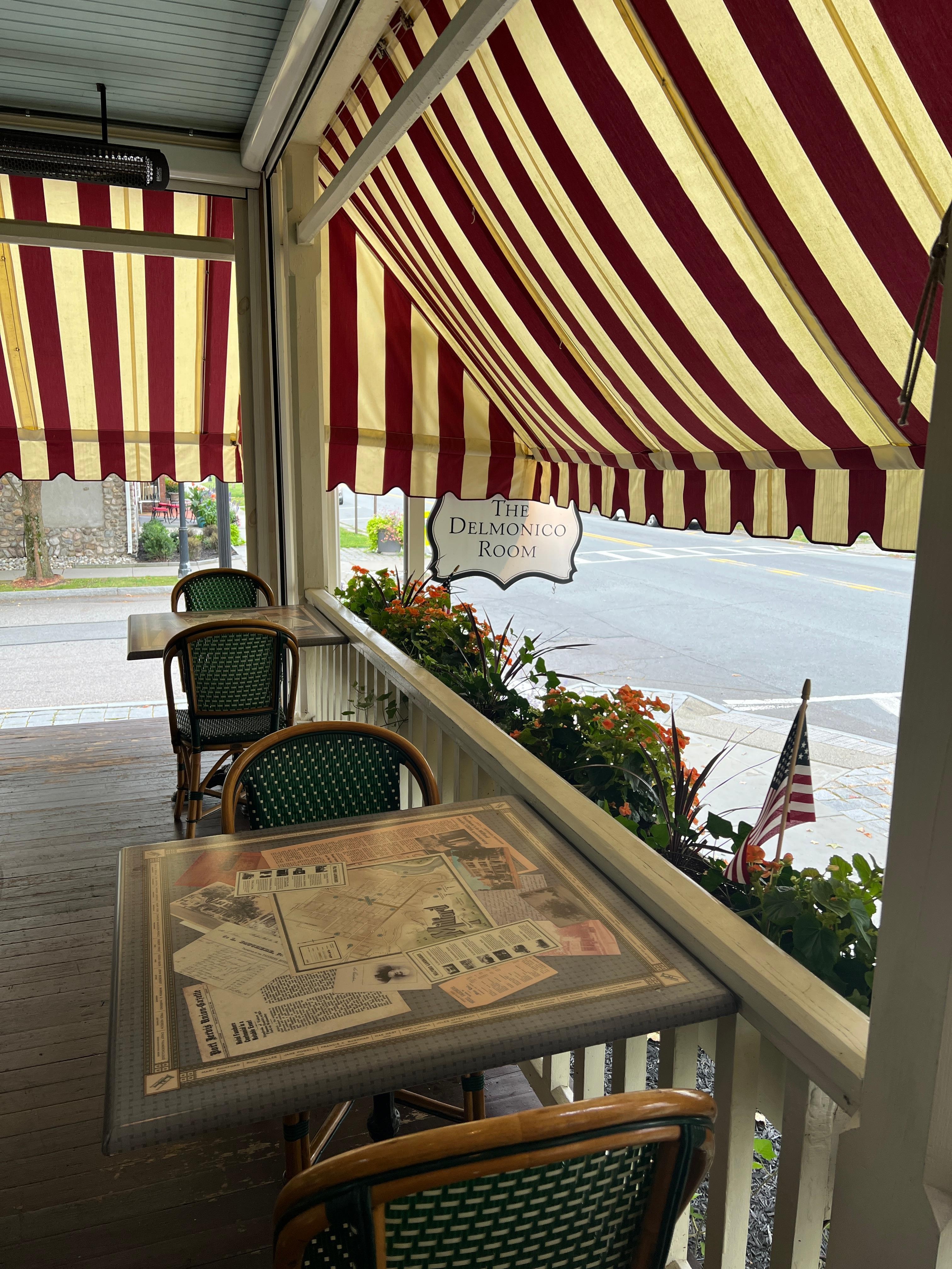 Love the porches and striped awnings.