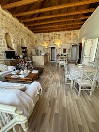 Shared cozy living and breakfast area make hotel more like a bed and breakfast