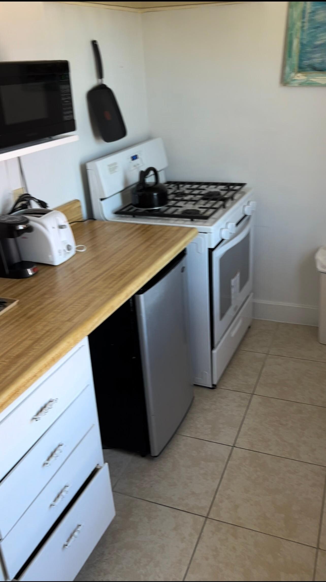 full kitchen, sink on the left