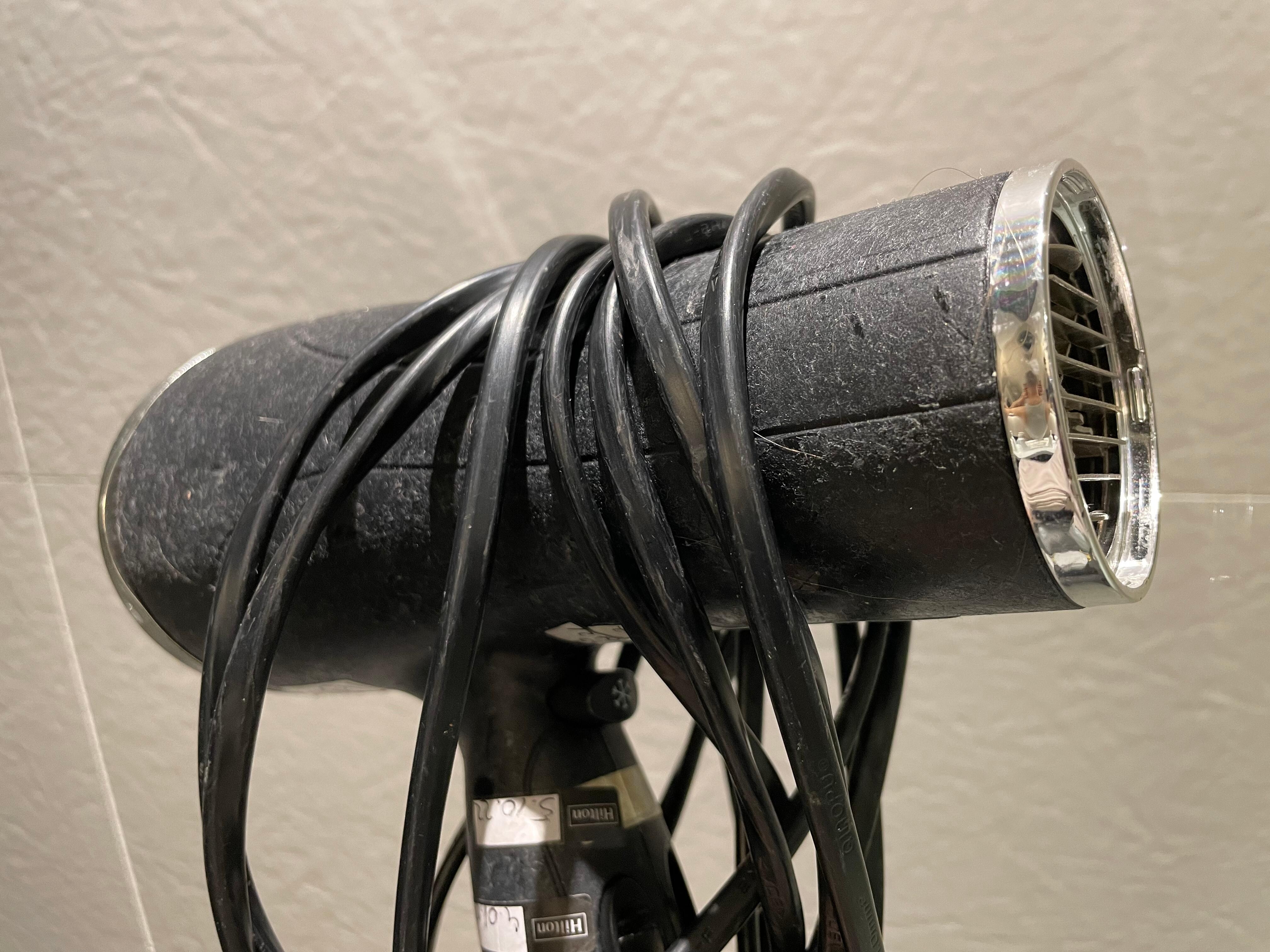 Terribly dusty hair dryer with hair 