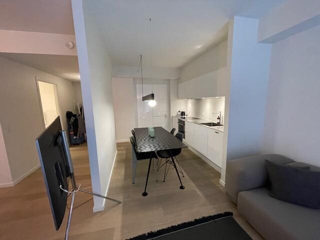 nice dinning table but the tripod of the TV is stretched to the dinning room.  People can easily kick on it and damage the TV.