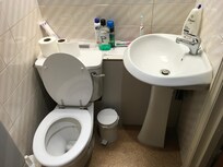 Basin on top of the toilet