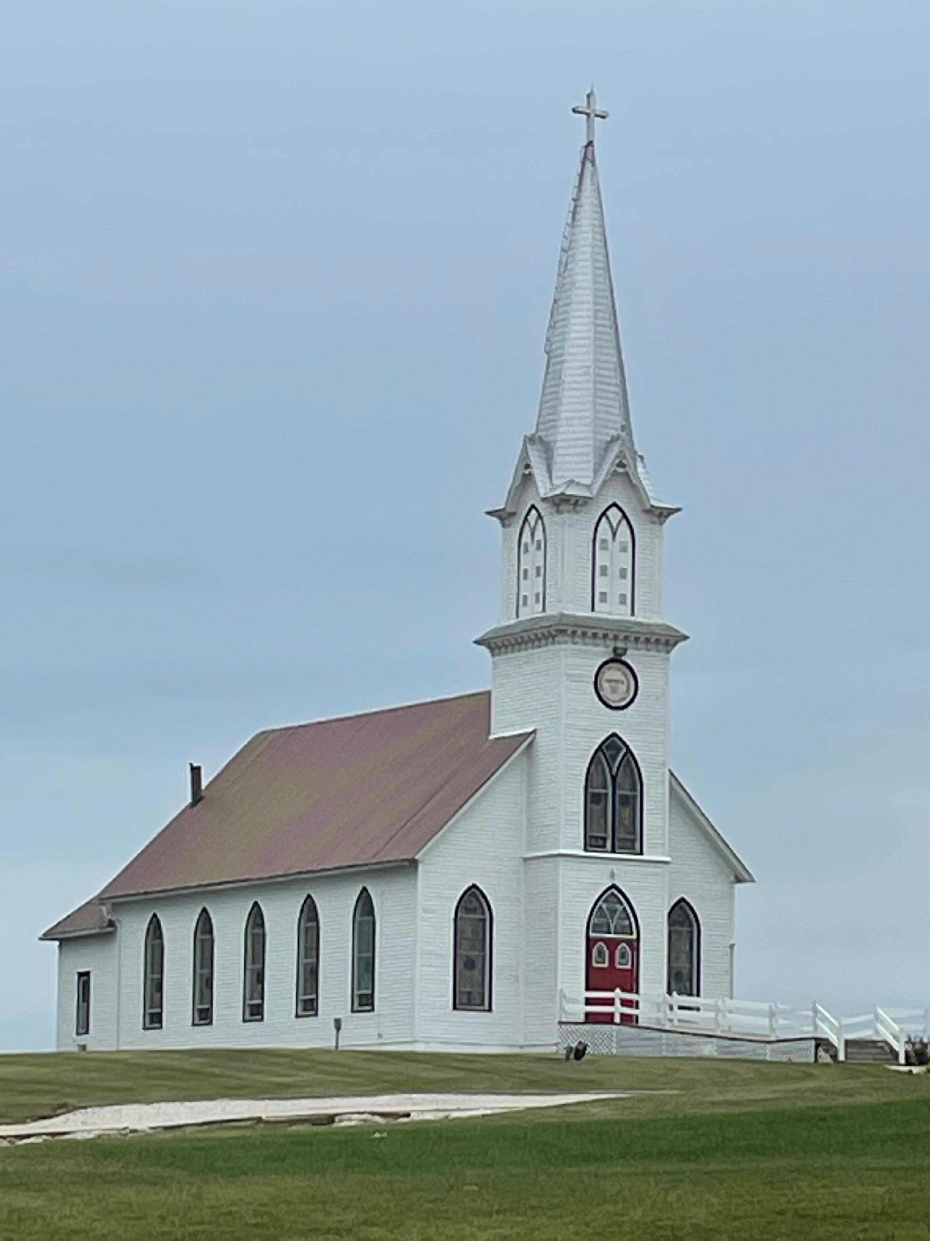 Church directly behind hotel.