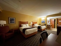 Recliner, 2 queens, desk, kuerig with plenty pods, large vanity stocked with
Supplies,