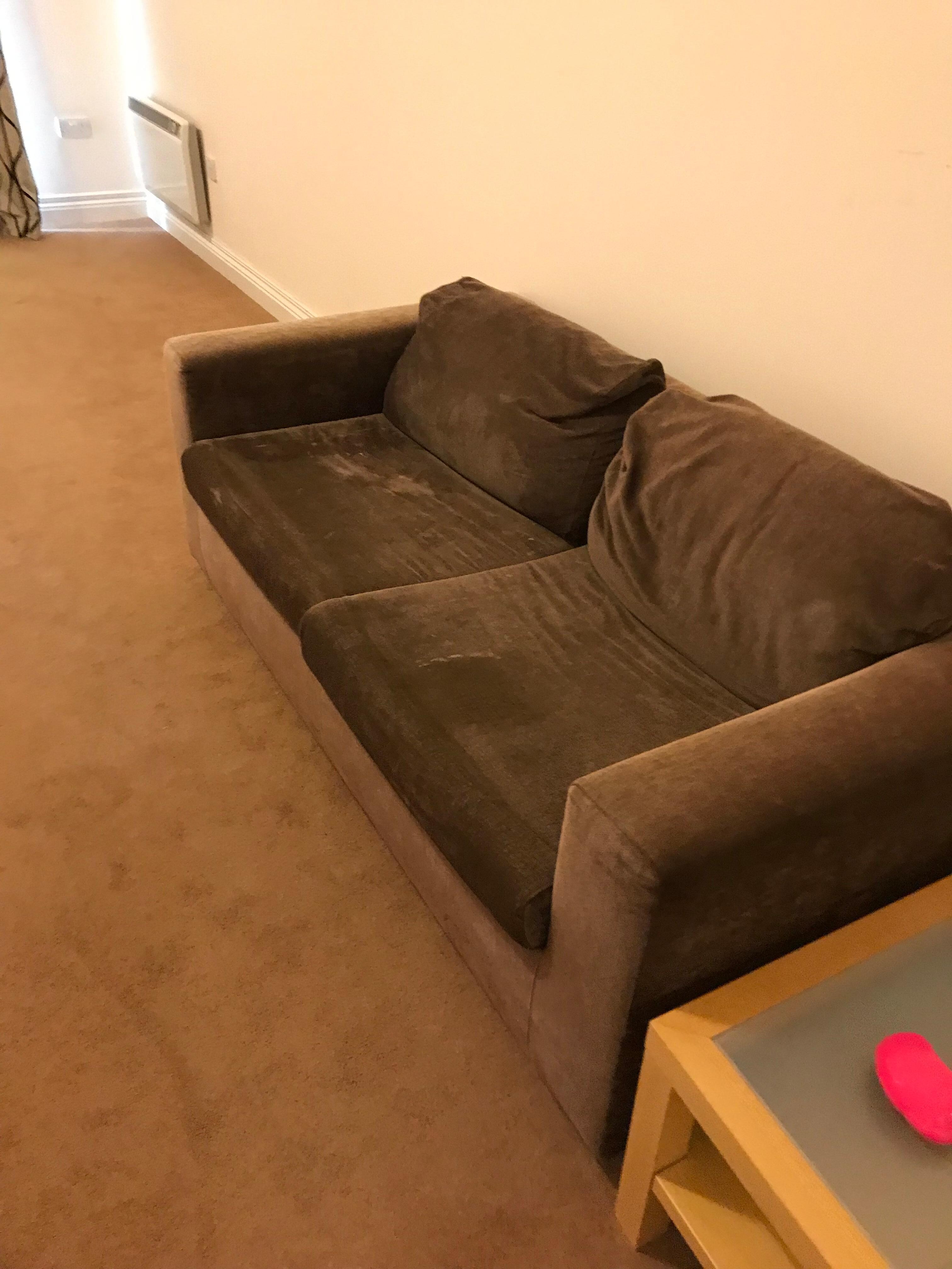 Mismatched couch with stains (hard to take picture of)- this was taken just after arriving