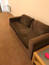 Mismatched couch with stains (hard to take picture of)- this was taken just after arriving