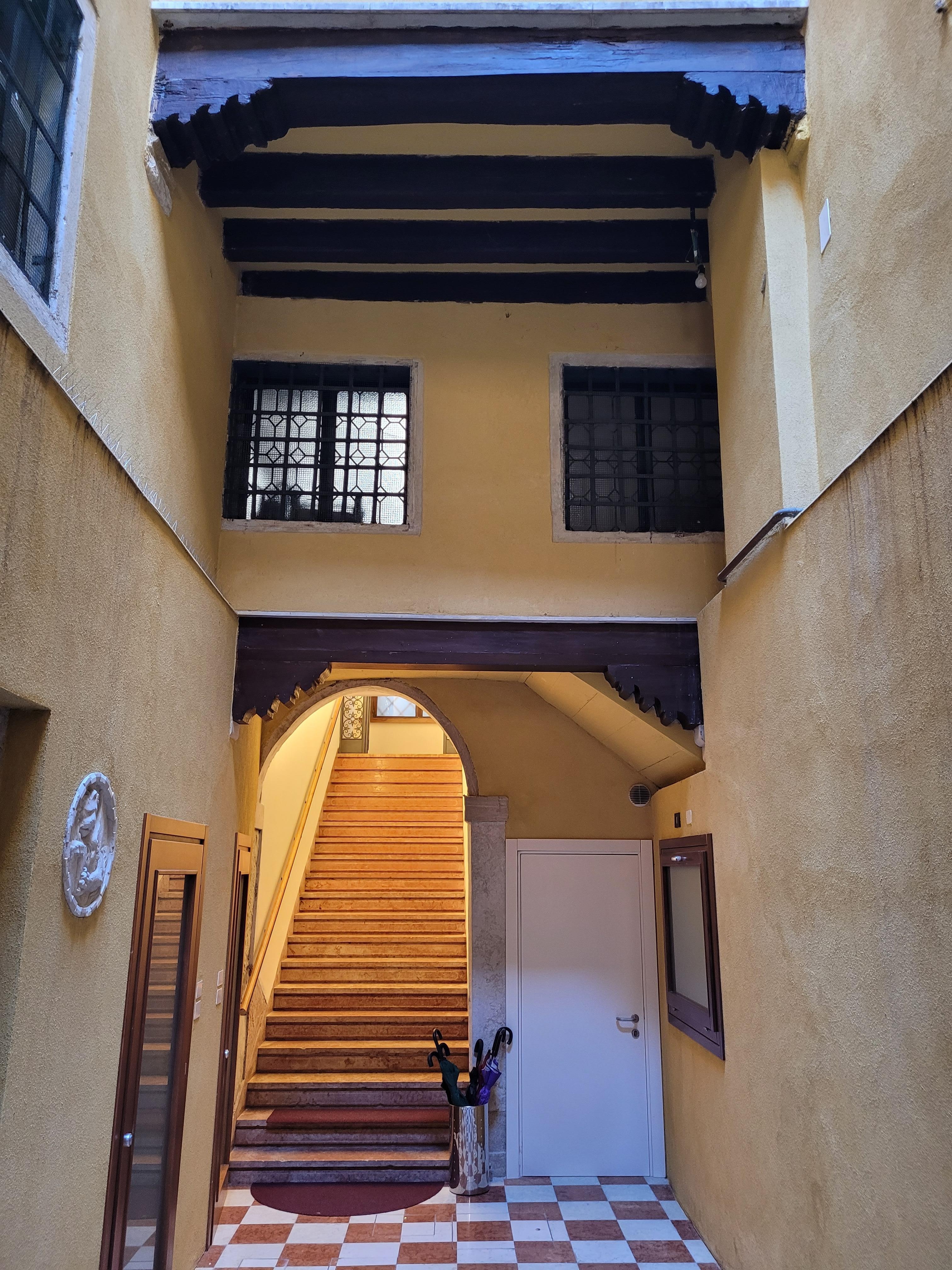 After entering door from outside...apt up the stairs