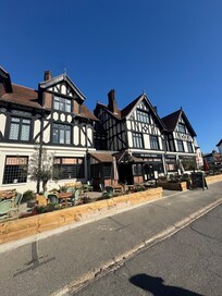 Lovely terrace at the front and back. Great in the sunshine (minus the smokers)