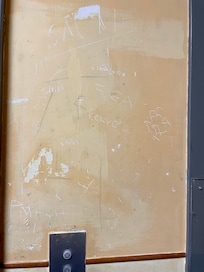 Next to the elevator