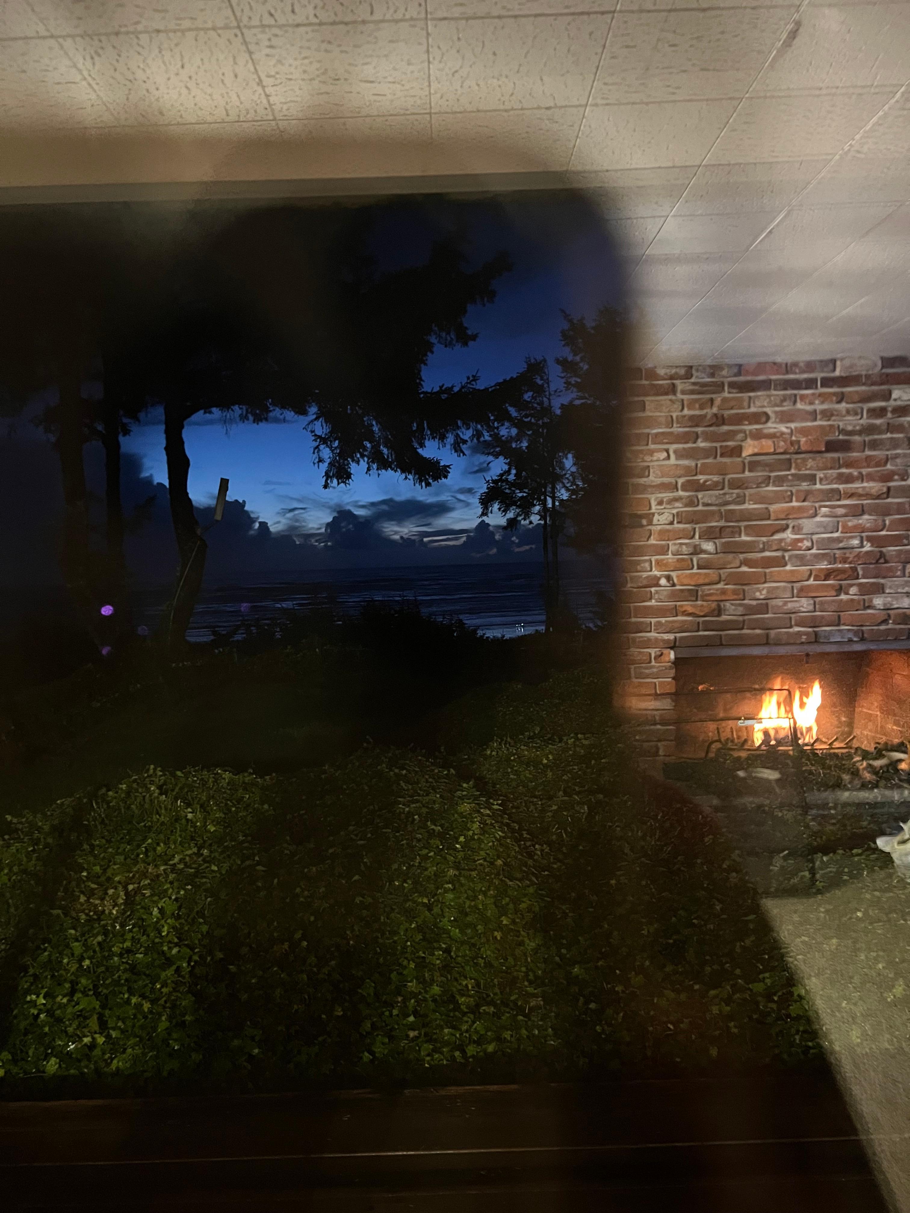 Ocean view at dusk and fireplace in back!