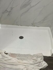 Shower floor filthy and mold stains and hairs