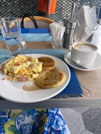 Eggs and pancakes breakfast.