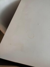 Coffe stains on desk.