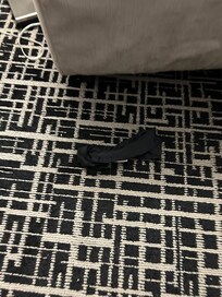 A woman’s underwear on the bedroom flor