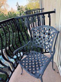 Outdoor furniture needs to be painted. Privacy on the balcony is an issue.