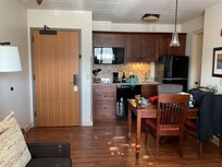 Well equipped kitchen with ice maker in frig