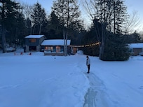 View of the house, standing out on the frozen lake.