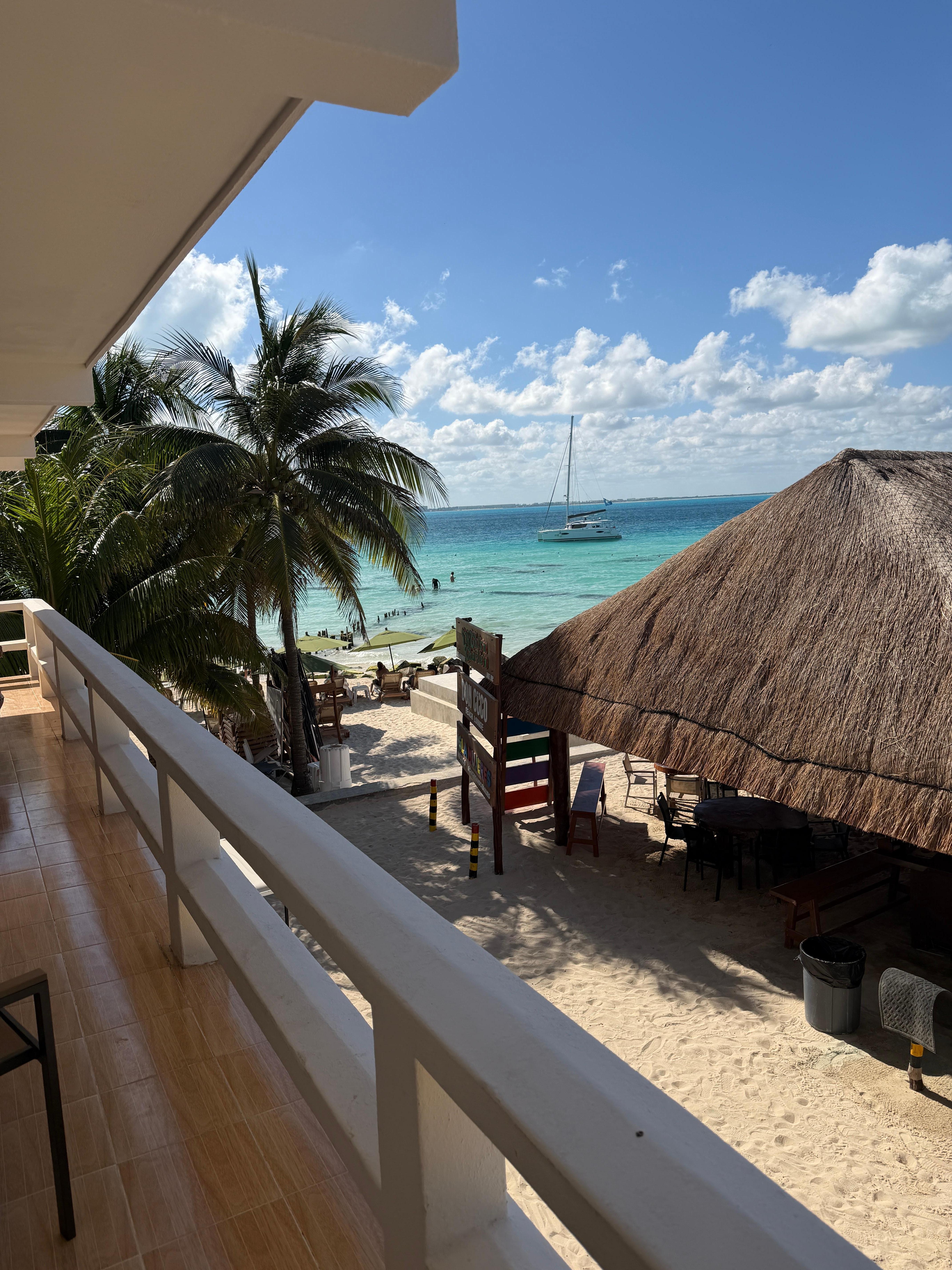 Lovely small patio area in front of our door- with table & 2 chairs