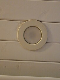 Water damage around leaking light fixture