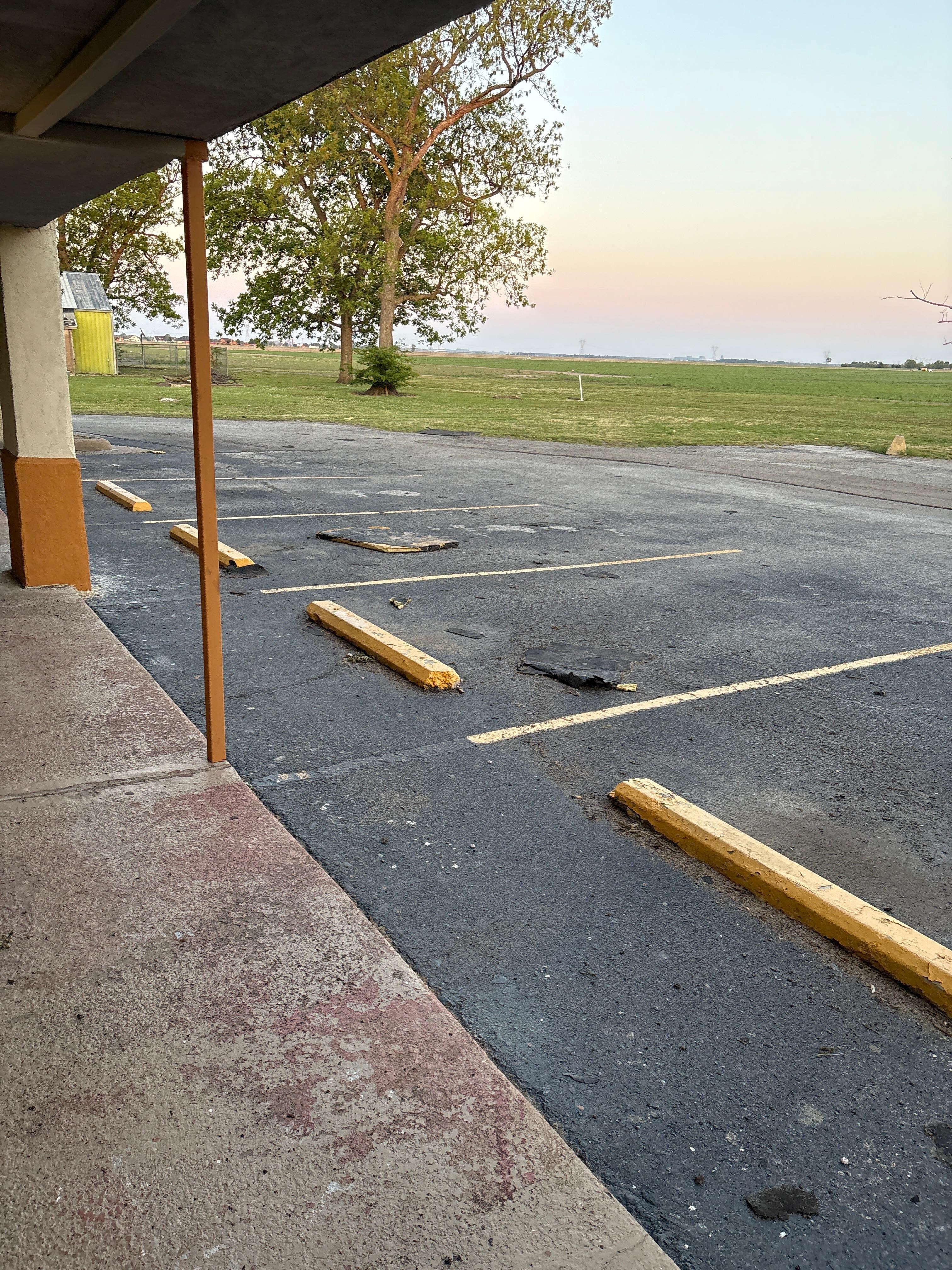 A storm came through and ripped off parts of the roof that scattered debris everywhere 