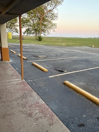 A storm came through and ripped off parts of the roof that scattered debris everywhere
