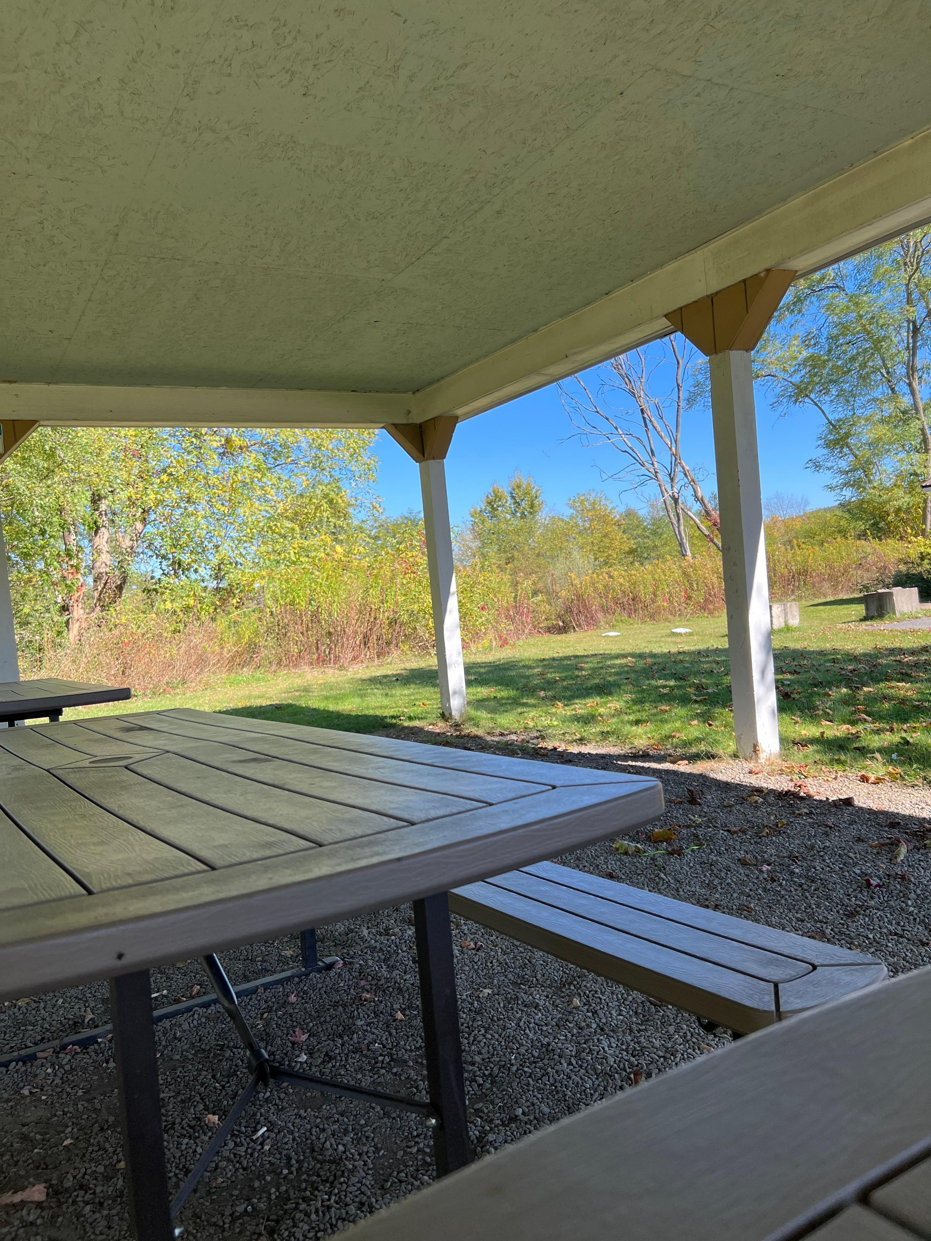 Covered seating area outside the hotel.